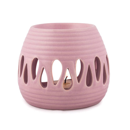 Blush ceramic wax burner styled for a cozy minimalist home fragrance ritual